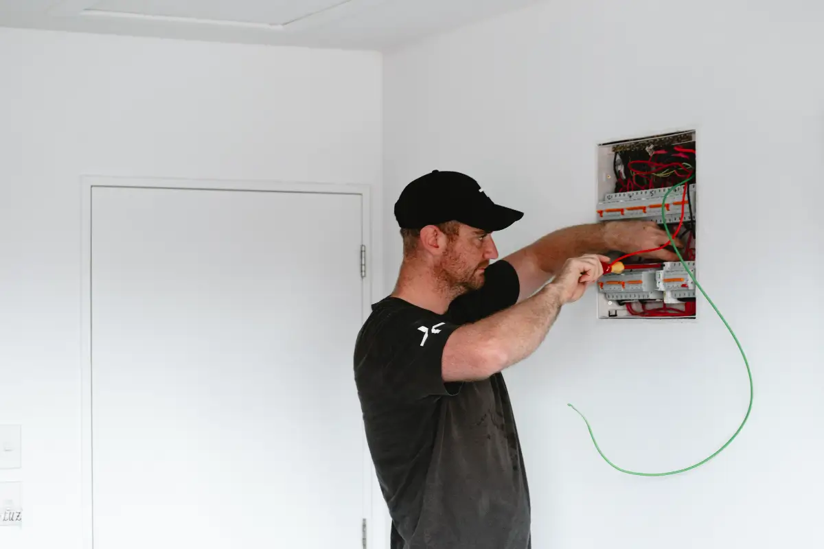 Electrician working on a home switchboard