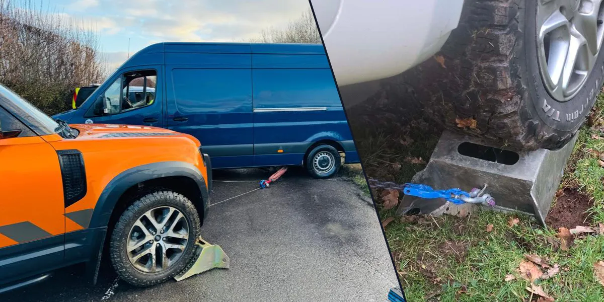 Yellow racing truck with logos driving on a track beside the text 'SOLID X POWER PERFORMANCE PRECISION' on a black background.