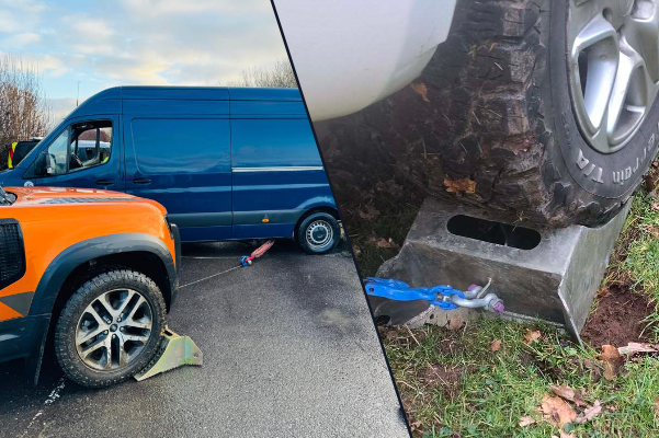 Yellow racing truck with logos driving on a track beside the text 'SOLID X POWER PERFORMANCE PRECISION' on a black background.