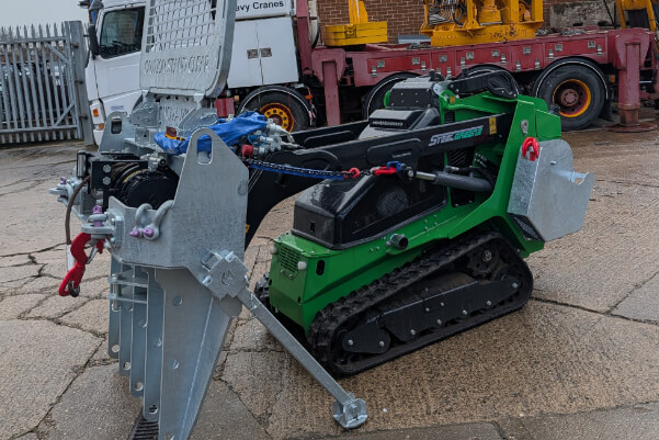 Yellow racing truck with logos driving on a track beside the text 'SOLID X POWER PERFORMANCE PRECISION' on a black background.
