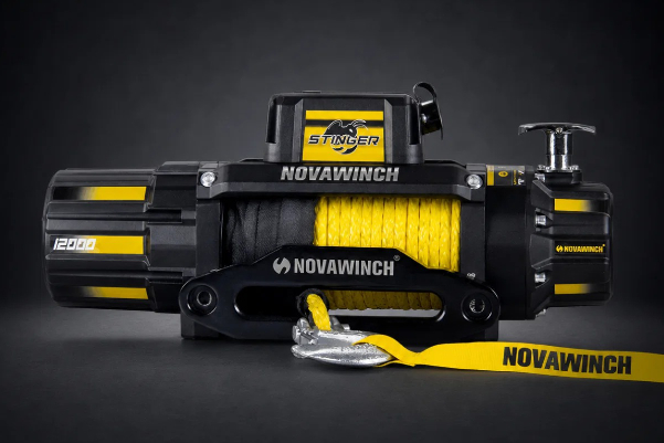 Yellow racing truck with logos driving on a track beside the text 'SOLID X POWER PERFORMANCE PRECISION' on a black background.