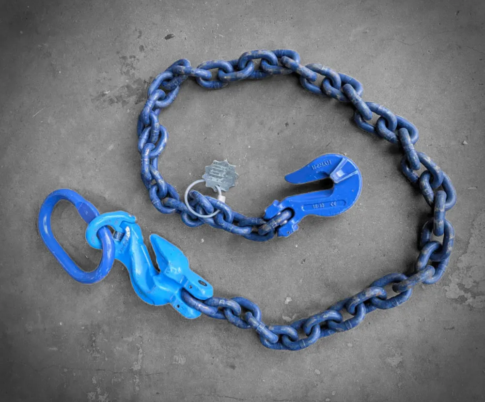 Collection of heavy-duty synthetic lifting slings in various colors and sizes, including flat web and round slings