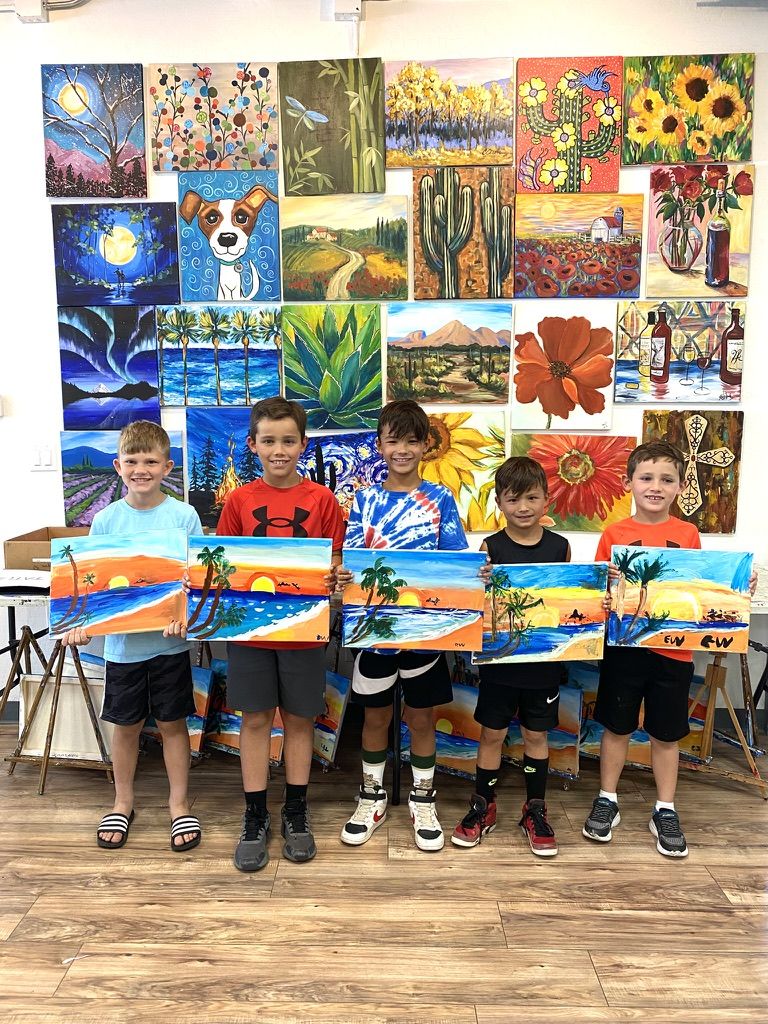 Kids show their paintings at Creative Color Art Studios