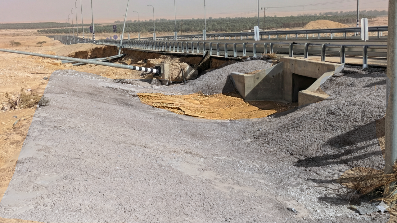 A decision to save money by not completing drainage canals on Israel's Route 90 led to a critical failure during a recent storm. Where the canal was built, there was zero damage. Where construction stopped, massive erosion destroyed lighting poles and guardrails. The cost of repairing this damage now significantly exceeds the budget originally "saved." This incident underscores that proper, first-time construction is not just a safety measure but a financial necessity, proving that the most expensive infrastructure is the kind you have to build twice.