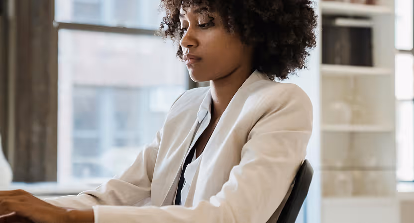 Healthcare data professional analyzing medical records for AI implementation and machine learning readiness