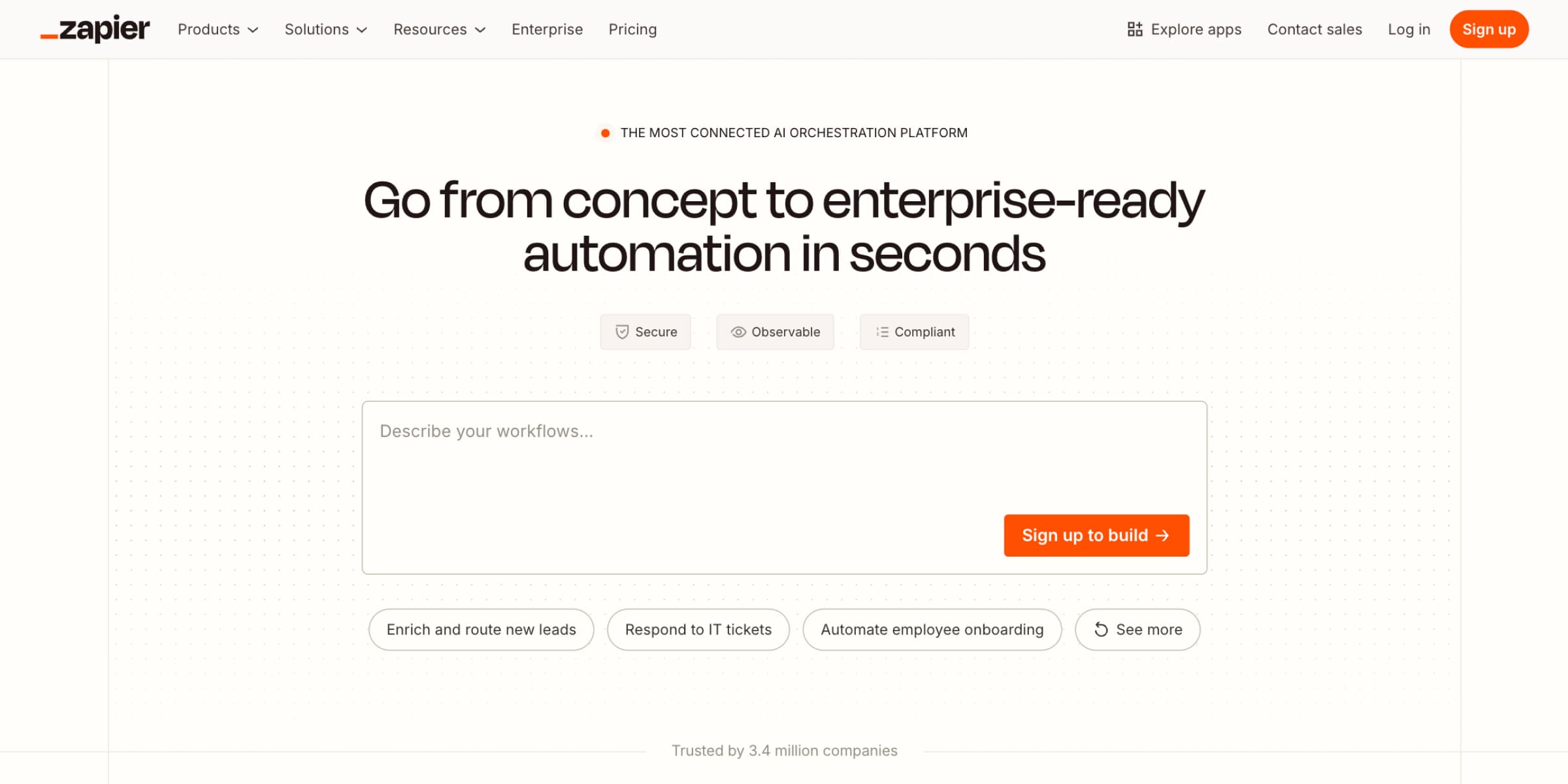 Screenshot of Zapier’s homepage promoting enterprise-ready automation, featuring the headline “Go from concept to enterprise-ready automation in seconds,” workflow description box, and call-to-action buttons.