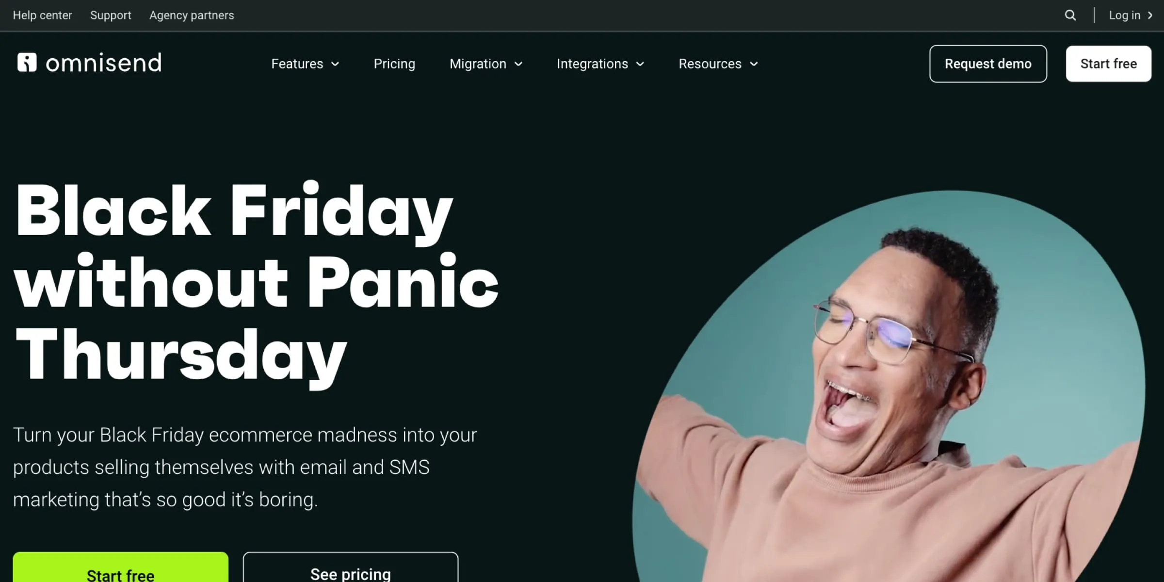 Screenshot of Omnisend’s homepage with the headline “Black Friday without Panic Thursday,” featuring promotional text about email and SMS automation and a smiling person celebrating with arms raised.