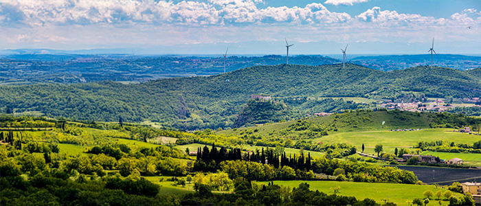 Wind turbines on a hilly Italian countryside vista