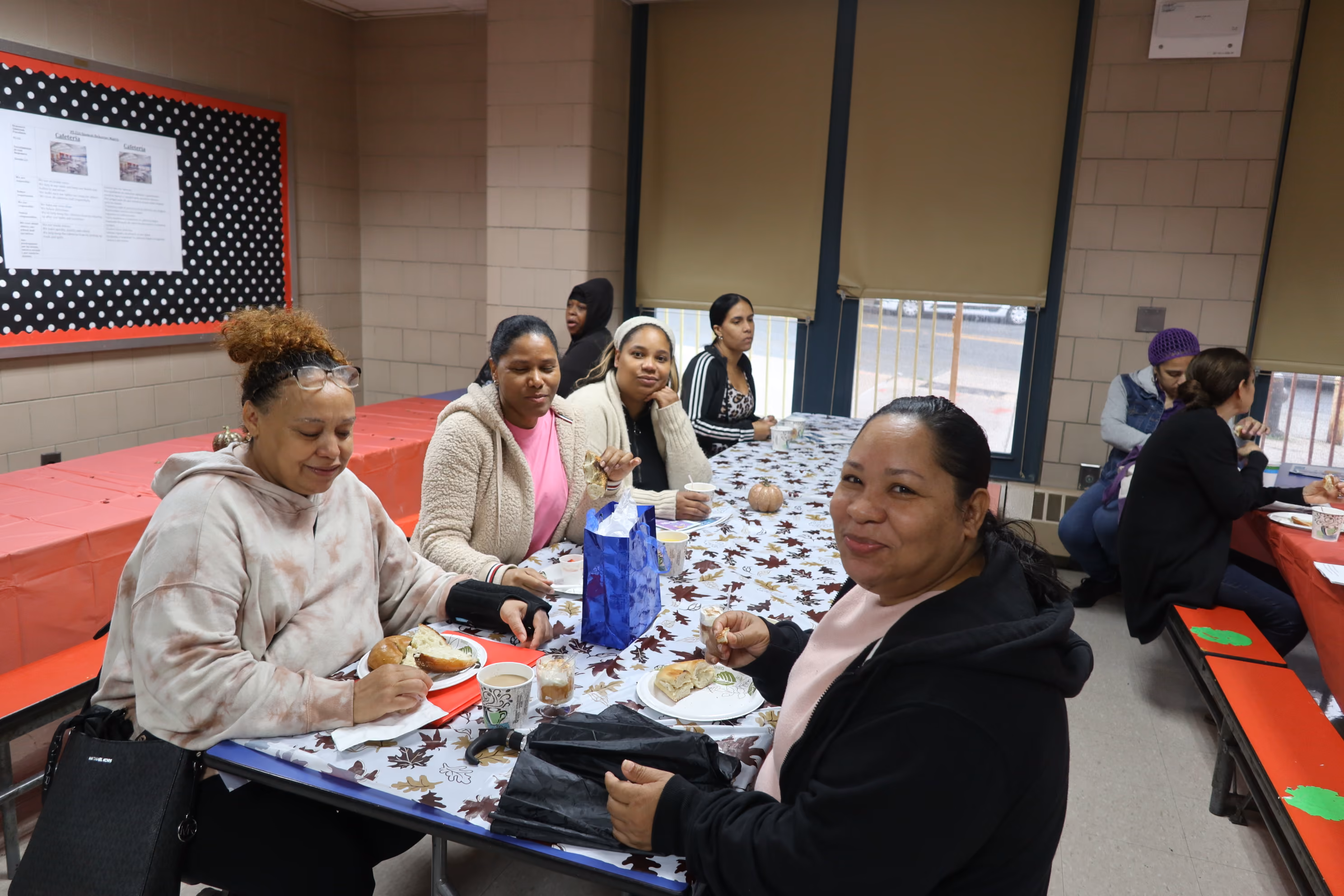 Parents gathering for a school community breakfast event