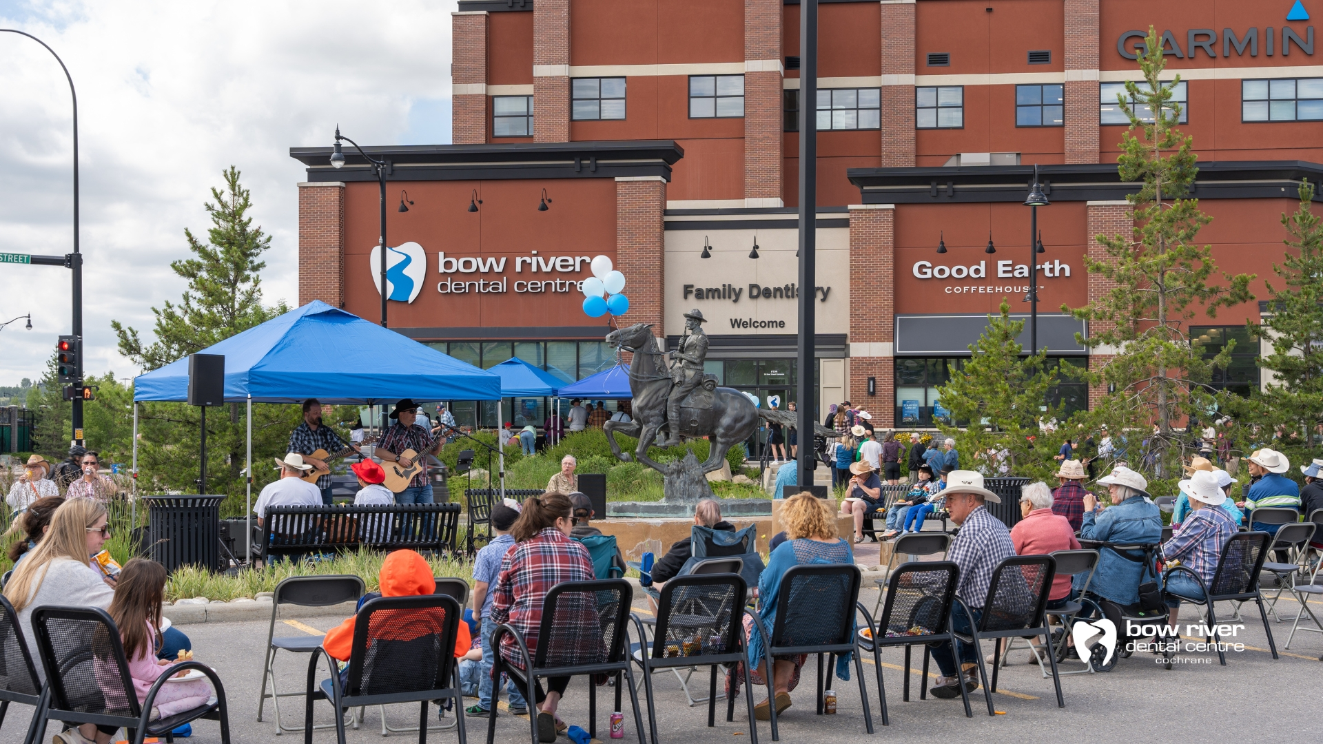 Community gathered outside Bow River Dental Centre Cochrane to celebrate Stampede 2025