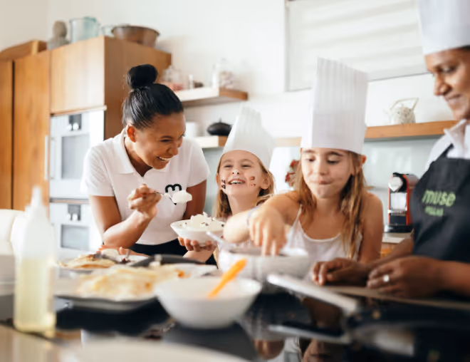 Kids having fun with the hotel staff members