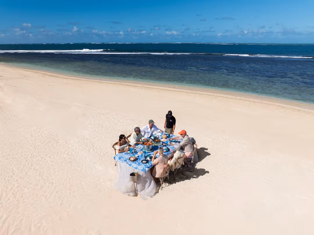Luxury holiday dining experience on the sand with Muse Villas.