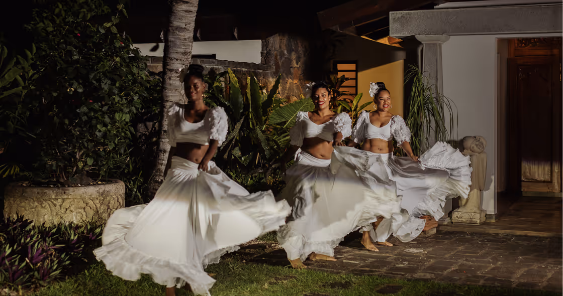 Mauritian Christmas celebration with muse villas: festive villa décor, palm trees, and ocean views.