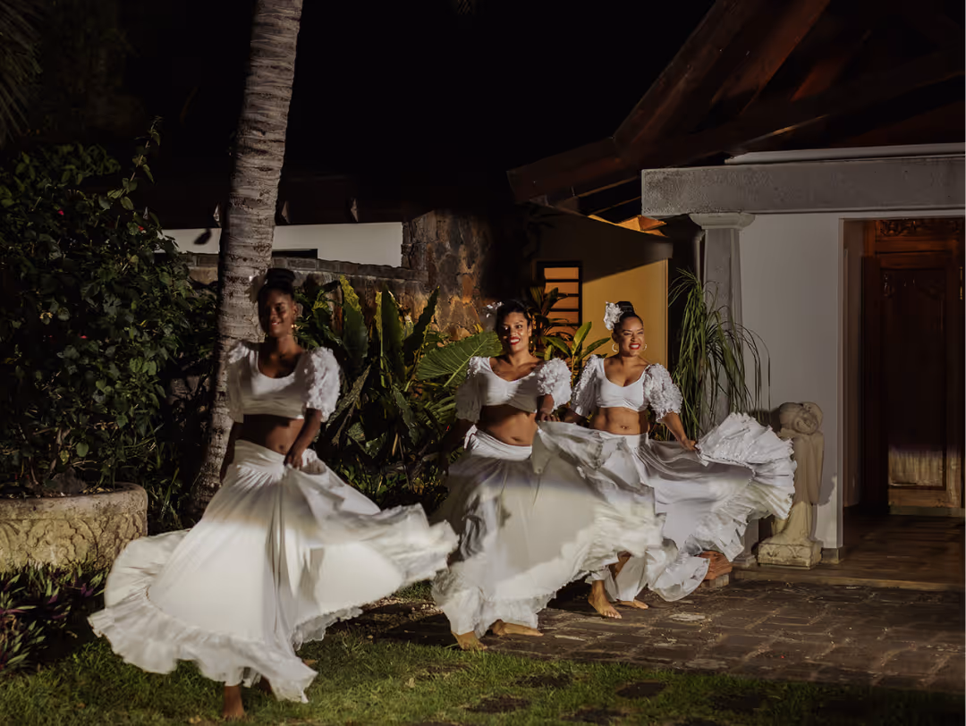 Mauritian Christmas celebration with muse villas: festive villa décor, palm trees, and ocean views.