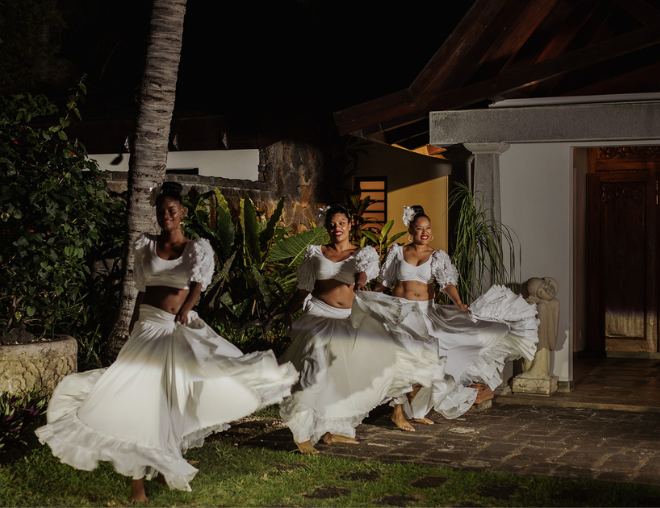 Mauritian Christmas celebration with muse villas: festive villa décor, palm trees, and ocean views.