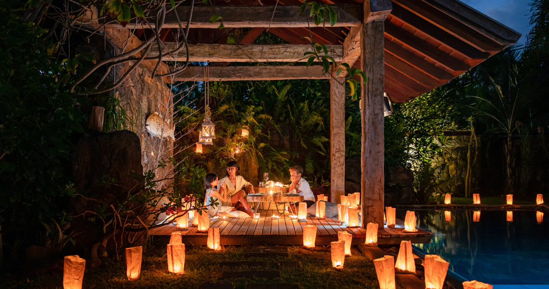 Luxury Christmas with muse villas: festive villa décor, private pool, and oceanfront tropical scenery.