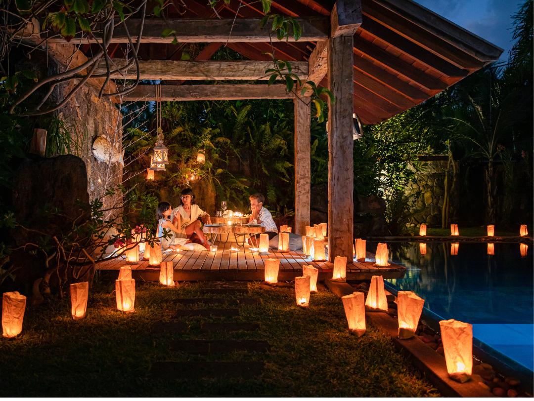 Luxury Christmas with muse villas: festive villa décor, private pool, and oceanfront tropical scenery.