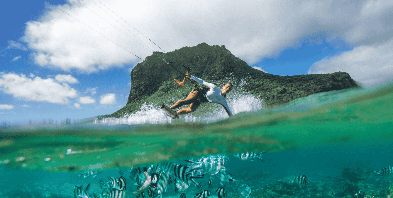 Kitesurfing session at sunset in Belle Mare lagoon