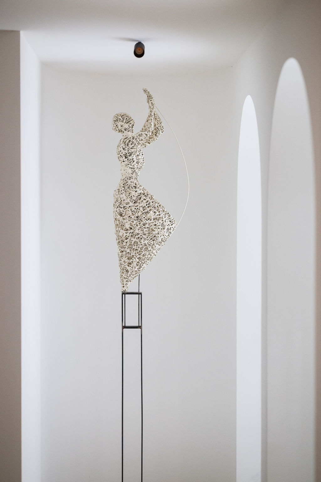Wire and plaster sculpture of a woman by Belgian artist Anne De Mol.
Steel base. One of a kind. 