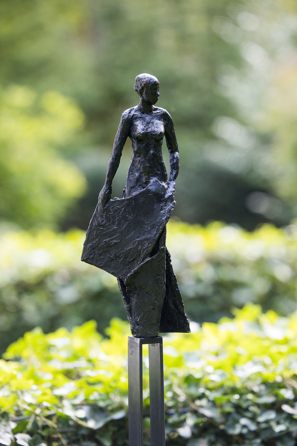 Sculpture in bronze by Belgian artist Anne De Mol. Edition of 8 + 4EA
Her techniques are varied, combining the strength of bronze, lightweight plaster and strings. In her works, the human remains at the center of its concerns, especially women, harboring sensuality, strength but also fragility. Balanced on top of sprawling socles, tangled in inextricable network of strings coated with plaster, movements or contemplative to the wide world around them, her bronze sculpted figures are invitations to jump in with both feet in the intoxicating world of Anne De Mol. An ode to life!