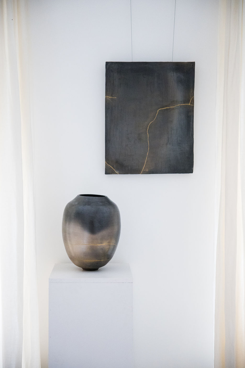 Karen Swami Ceramic Art – Touareg Series – Wheelthrown Stoneware, Smoke Fired, One of a Kind. Explore the exquisite craftsmanship of Karen Swami ceramics, where the mastery of matter, oxides, and flames comes together to create unique works of art. Specializing in sandstone and earthenware, Karen Swami pushes the boundaries of traditional pottery techniques, refining shapes and enhancing colors to create contemporary ceramic art that is both fragile and powerful. Inspired by the timeless beauty of Etruscan vases, Karen Swami’s work reinterprets ancient forms with sumptuous curves and modern contemporary lines, making each piece a stunning decorative addition to any space. The Touareg series features wheelthrown stoneware, expertly smoke fired to bring out rich textures and tones, resulting in one-of-a-kind ceramic pieces. Crafted for decorative purposes only, Karen Swami’s ceramic art pieces are more than just functional—they are true works of art, perfect for collectors and lovers of unique handmade pottery. Elevate your home or collection with the beauty of Karen Swami's smoke-fired ceramics today.