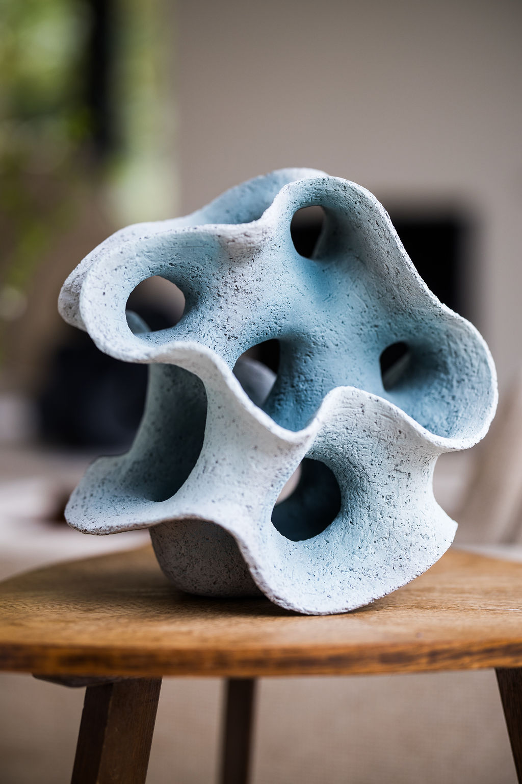 Discover Liliane Demeester’s Blue Grey ceramic sculpture—an organic, O’Keeffe-inspired art piece that elevates modern interiors with bold, sensuous curves. 