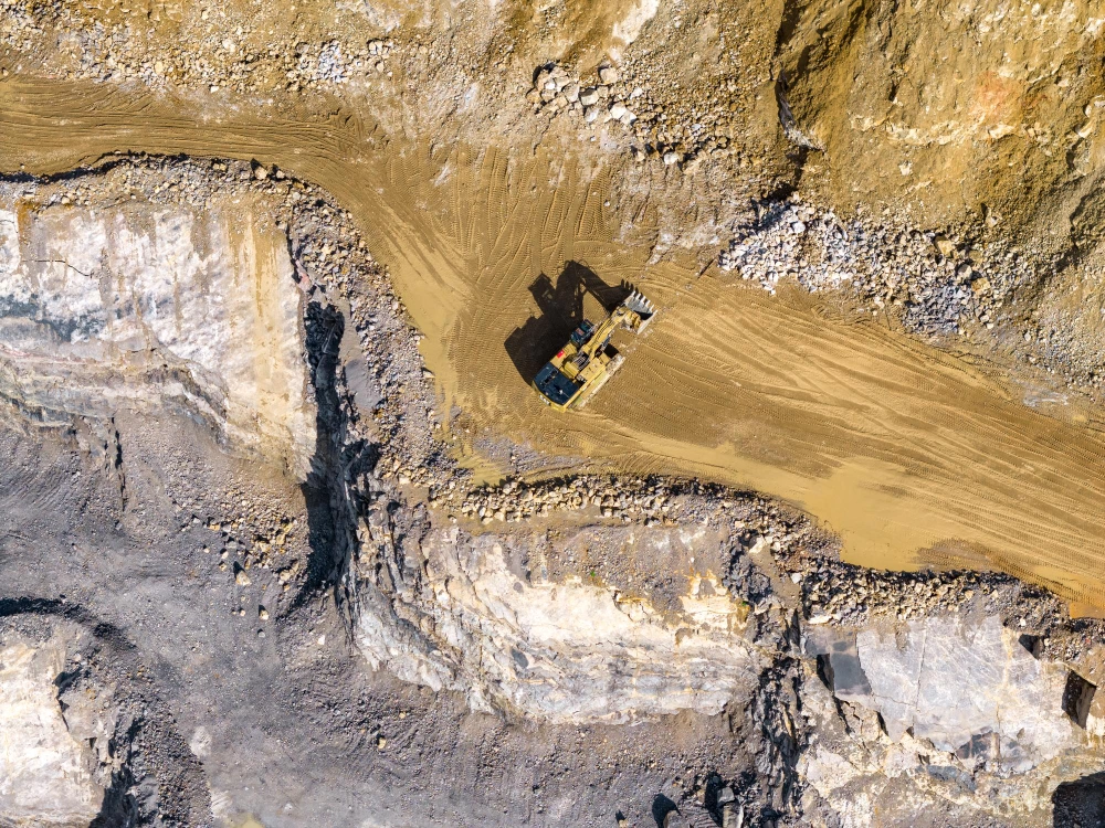 Aerial view of a bulldozer in a coal mining area