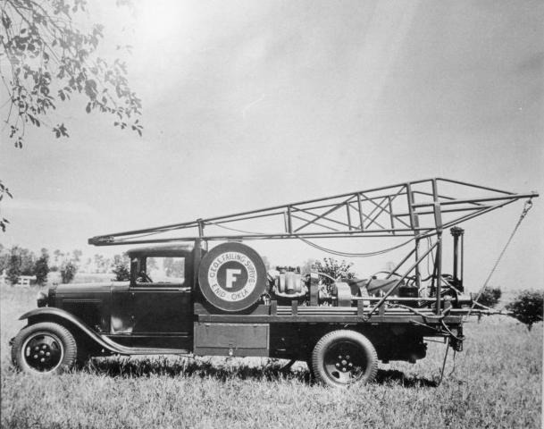 An original black and white photo of George Failing's portable drilling rig from 1933