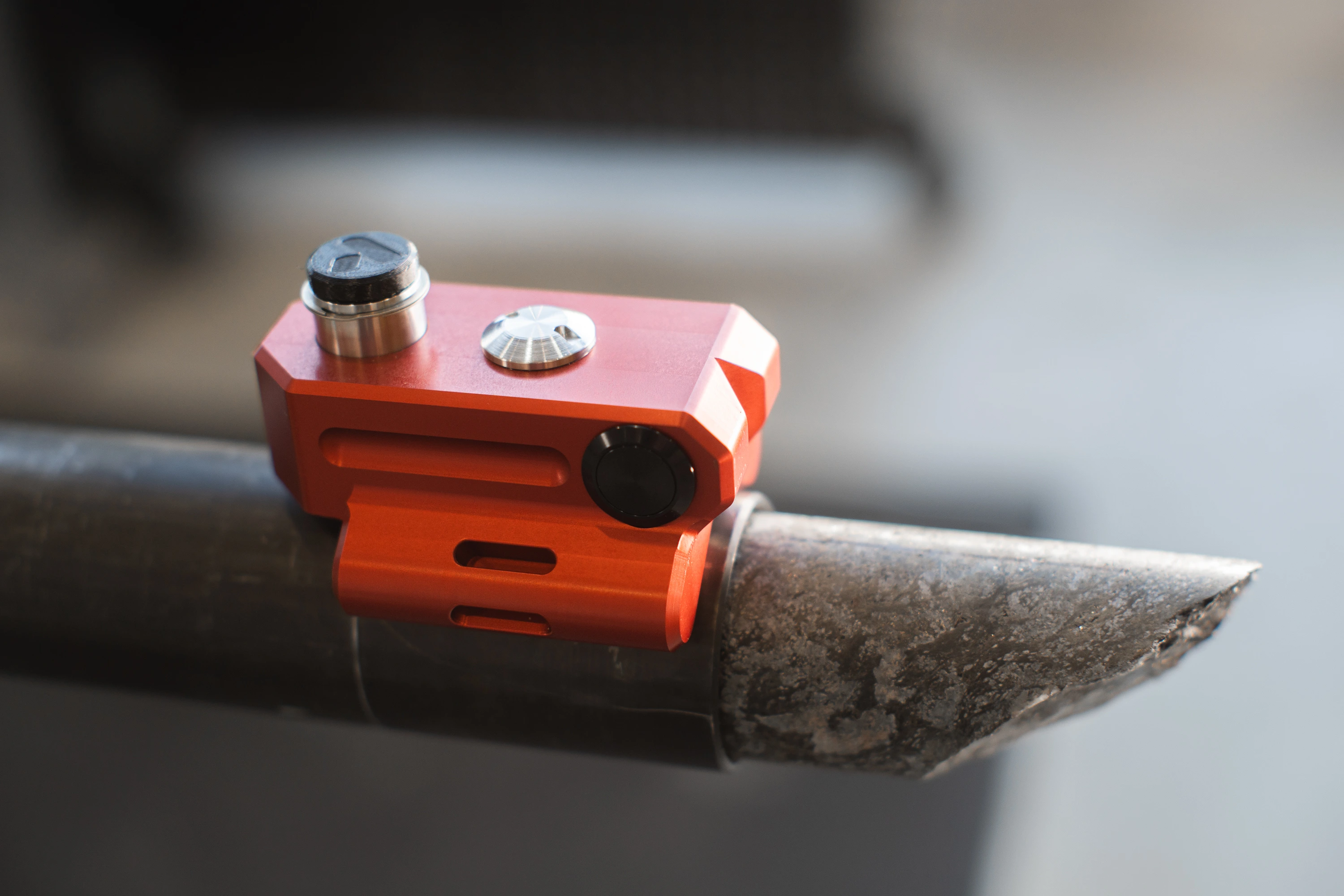 The OriCore by Aziwell placed on a drill, showcasing the red core orienter.