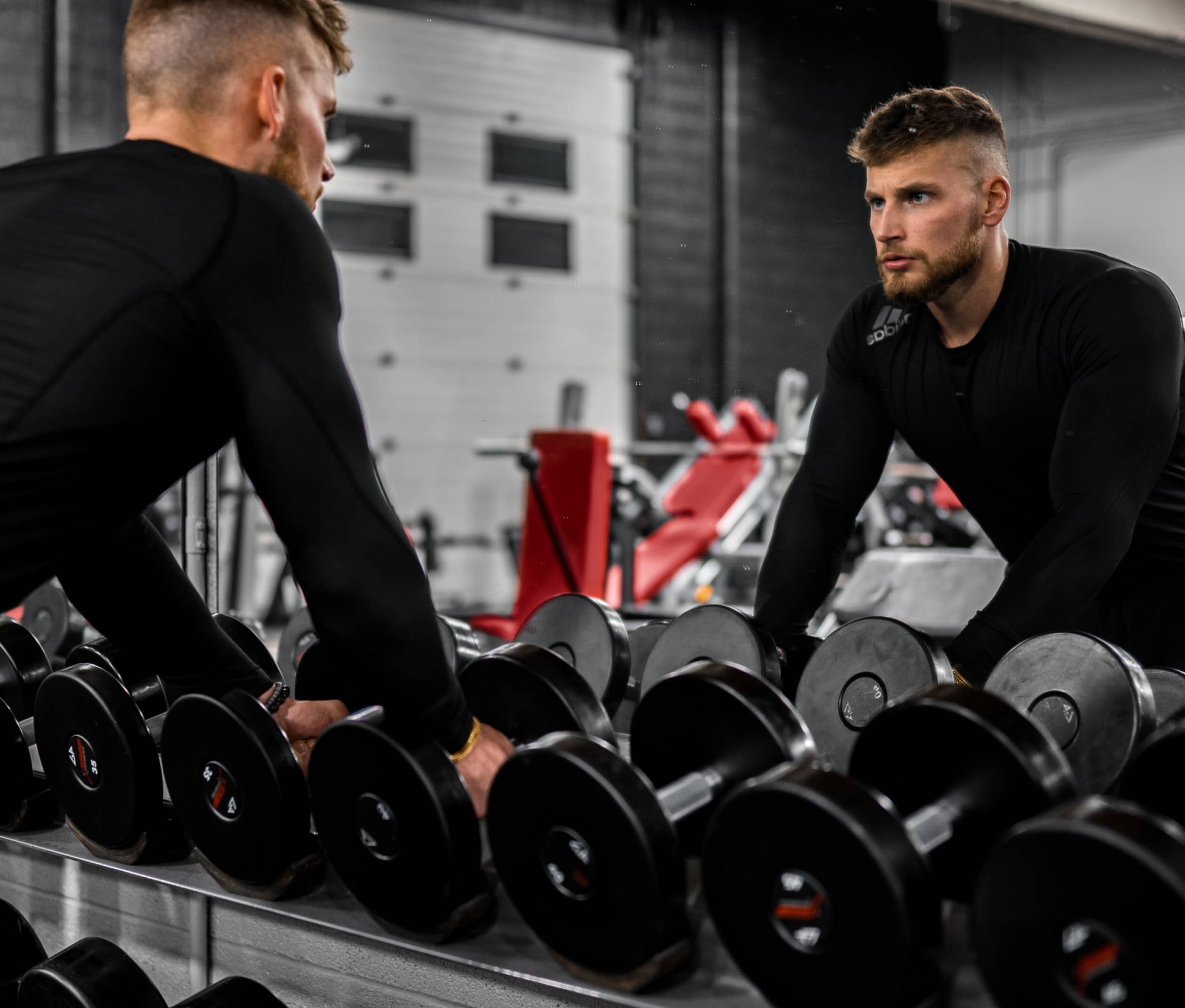 The Story Behind Our Gym Man Pick Dumbbell Front Mirror - Gymnastic X Webflow Template