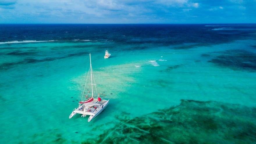 Fly to Mauritius and check into the luxurious Four Seasons Resort Mauritius at Anahita. Spend the day exploring the island’s vibrant marine life—kayak through lush mangrove forests or snorkel amid colorful coral reefs teeming with tropical fish. Relax on pristine white-sand beaches or unwind in your private villa. With warm breezes and turquoise waters, embrace the laid-back elegance and natural beauty of this Indian Ocean paradise.