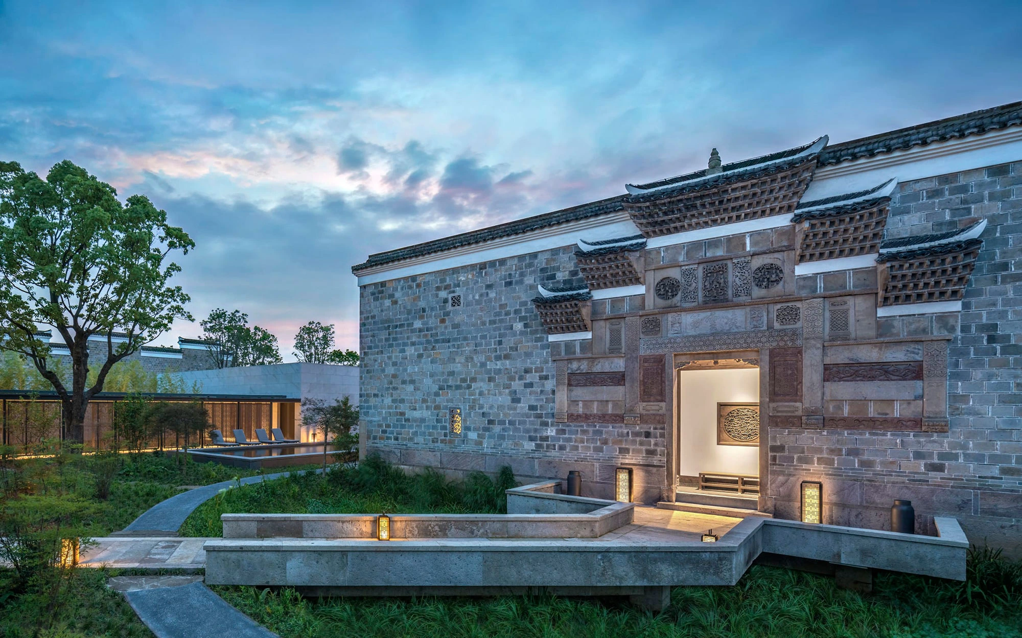 Fly from Osaka to Shanghai by private jet and transfer to the serene Amanyangyun resort. Spend your afternoon engaging in traditional Chinese art forms such as calligraphy, guqin music, incense ceremony, and brush painting. Later, join a guided architectural tour of the antique Ming and Qing dynasty villas before enjoying cocktails, dinner, and a lecture on the property's rich heritage.