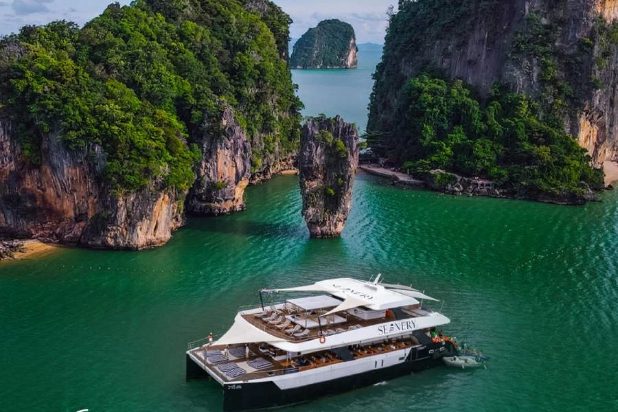 Sail through Thailand`s iconic Phang Nga Bay on a luxury yacht, weaving between limestone karsts and hidden beaches. Enjoy a relaxing island stop for swimming and sunbathing, with lunch served onboard against a stunning natural backdrop. Return to Amanpuri in the late afternoon and spend your evening at leisure-either dining at one of the resort`s elegant restaurants or discovering Phuket`s local culinary scene independently.