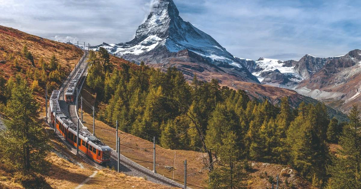 Board the cog railway to Gornergrat for breathtaking views of the Matterhorn and surrounding peaks. Continue with a guided alpine hike, tailored to your pace and interests, followed by a gourmet lunch at a panoramic mountain restaurant. Return to Zermatt to explore boutiques, sip wine in cozy cafes, or unwind at Mont Cervin Palac`s spa before an evening enjoying Swiss culinary excellence.
