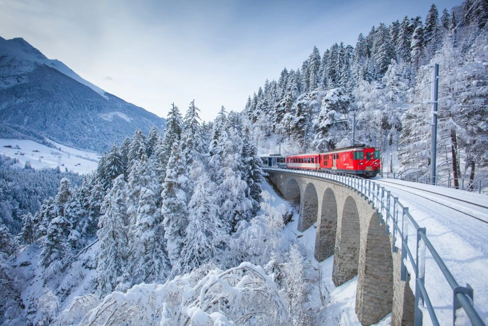 Continue aboard the Glacier Express over the Oberalp Pass, through the Rhine Gorge, and across the UNESCO-listed Albula viaducts to St. Moritz. Check into Badrutt`s Palace for a three-night stay. Enjoy the afternoon at leisure, browsing designer boutiques, strolling along Lake St. Moritz, or relaxing in your opulent suite. End the day with exceptional fine dining in the hotel`s celebrated restaurants.