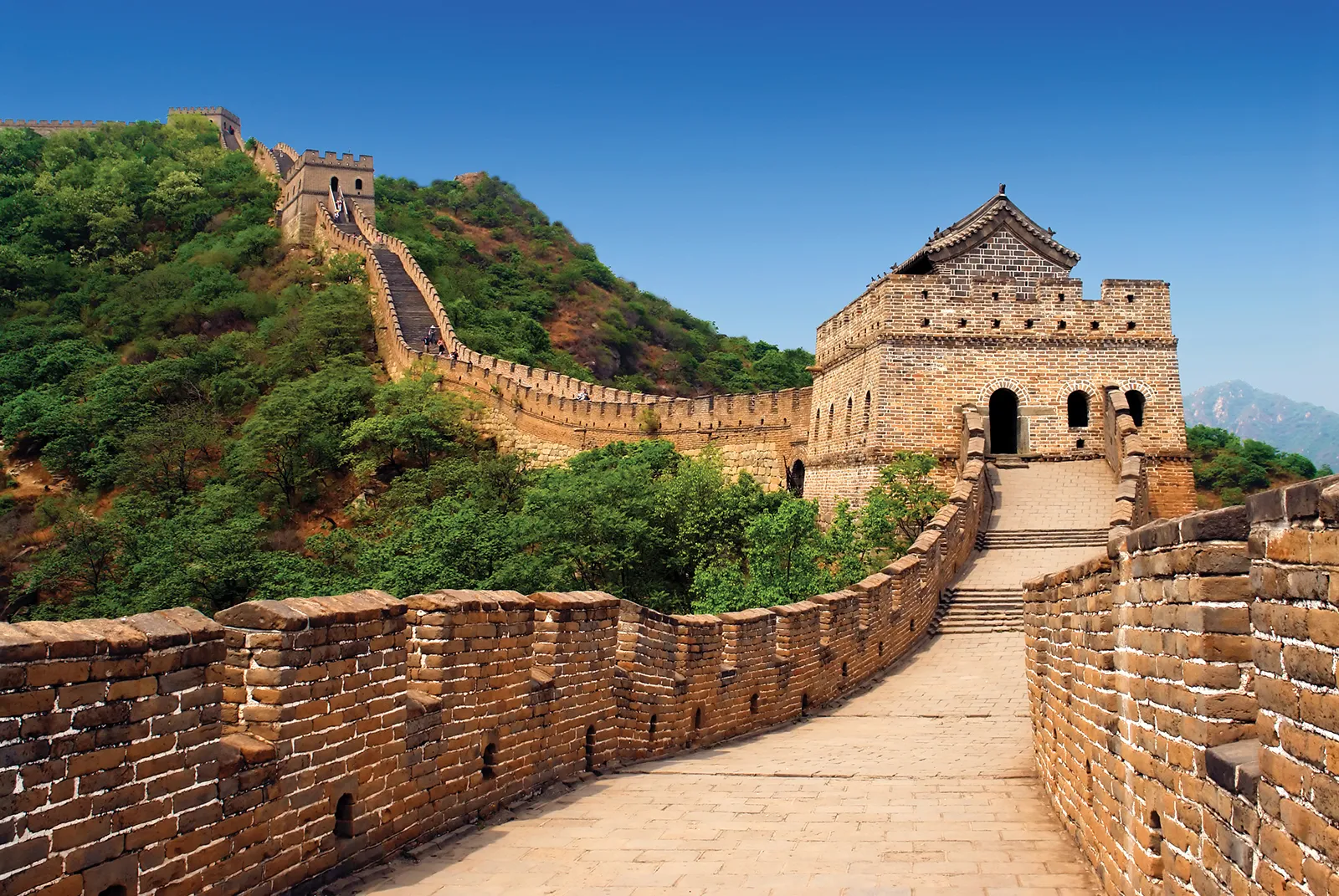 Embark on a private excursion to the Great Wall of China, exploring a less-crowded section where sweeping mountain vistas frame the ancient ramparts. Stroll along this iconic wonder at your own pace, enjoying the serenity and history of its stones. Later, return to Beijing for time at vibrant markets or to simply unwind in luxury at the Peninsula Beijing.