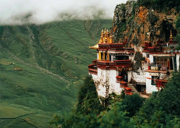 Continue your exploration of Tibet with guided visits to ancient monasteries steeped in history and spirituality. For those seeking adventure, opt for a short hike to the sacred Drak Yerpa caves, a site of meditation retreats with sweeping Himalayan views. Gain profound insights into Tibetan Buddhism while surrounded by serene mountain landscapes. Return to your Hotel for dinner and a restful overnight stay in Lhasa.