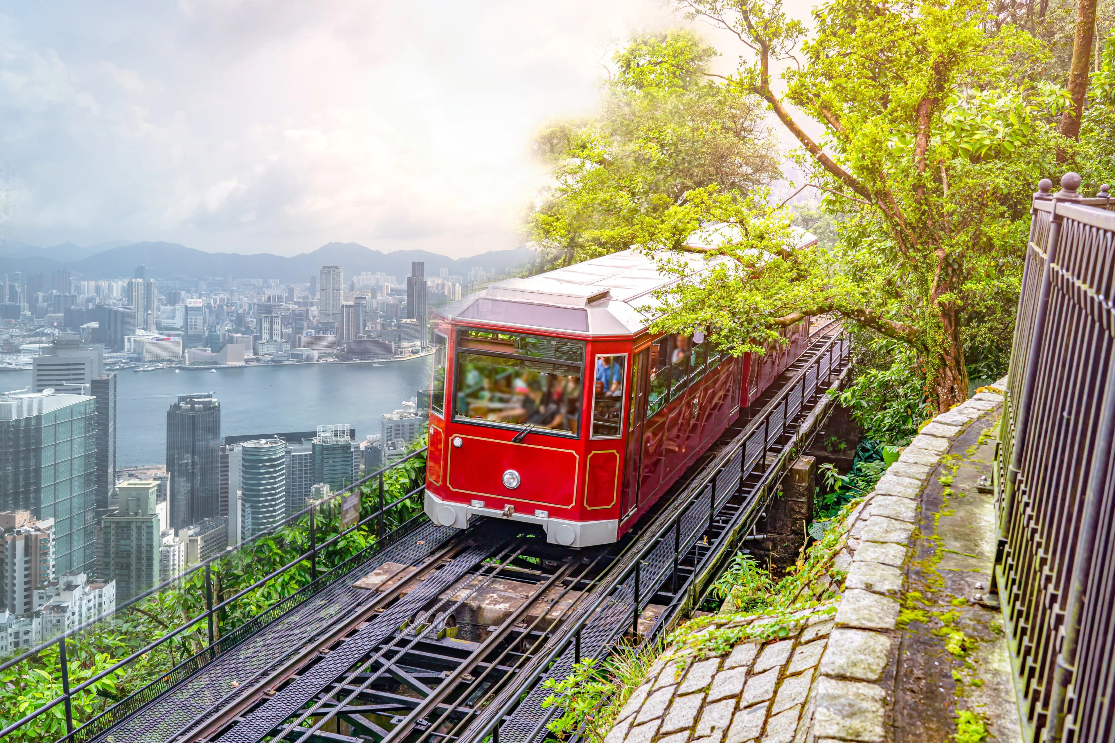 Spend the day discovering Hong Kong with your private guide. Ride the tram to Victoria Peak for panoramic city views, cruise Aberdeen harbor on a traditional sampan, and browse lively street markets. Stroll through fashionable neighborhoods such as Soho, with time to sample authentic dim sum or indulge in luxury shopping. Return to the comfort of the Four Seasons Hotel for an evening at leisure.