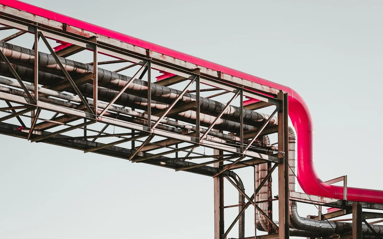 a red pipe going up into the sky