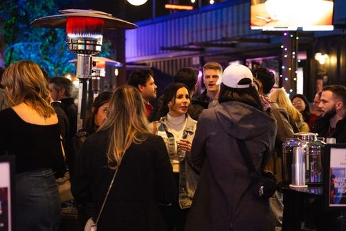 A networking event taking place at a brewery