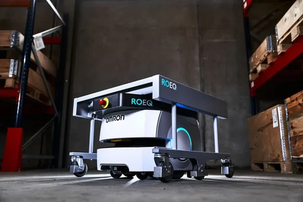 ROEQ TMC130 cart system on Omron LD-90X AMR in warehouse environment.