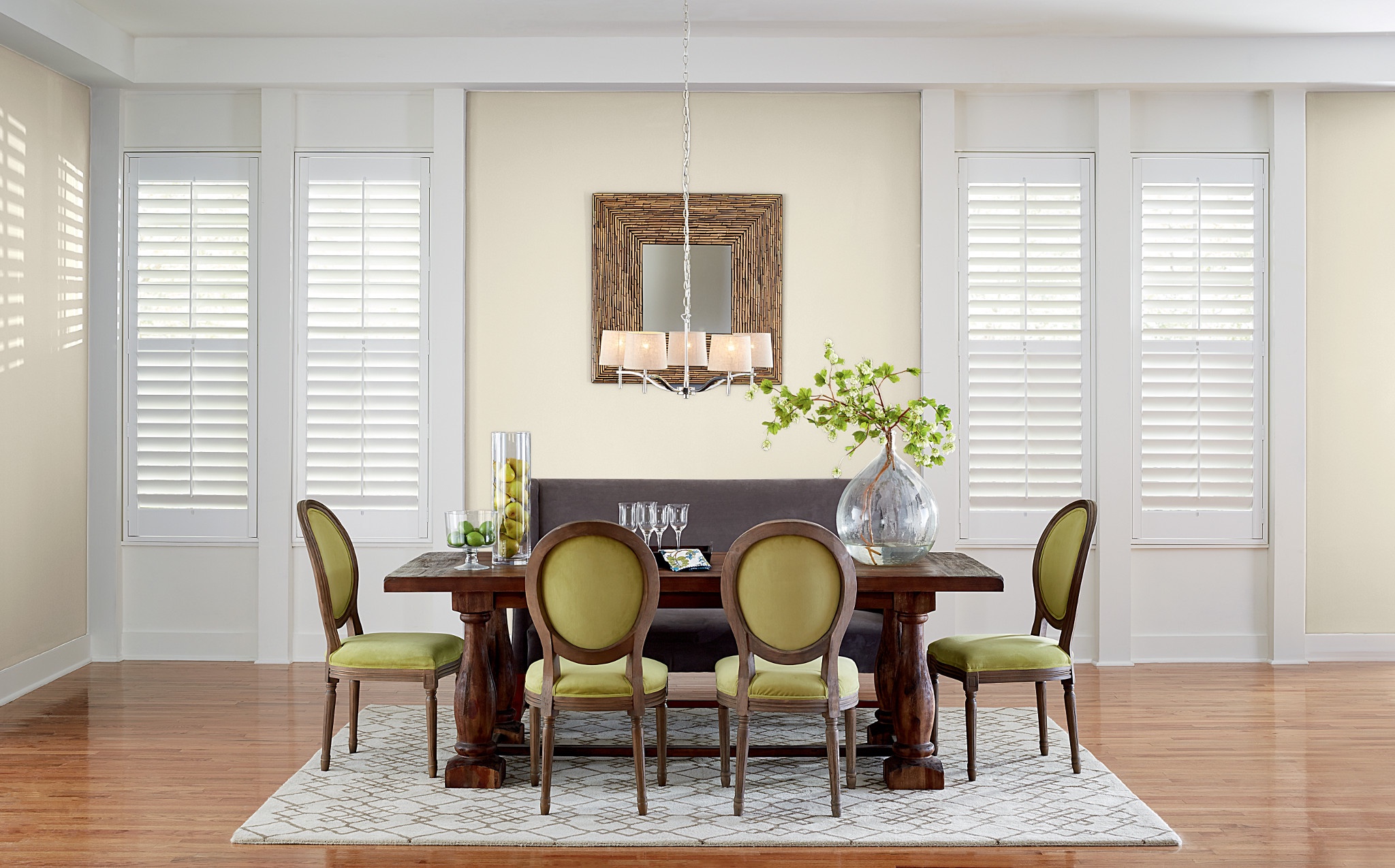 White composite shutters in a formal dining room