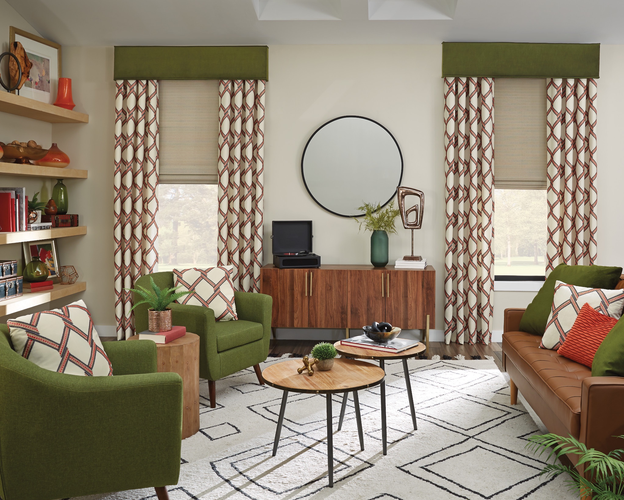 Patterned custom drapery and shades in a living room