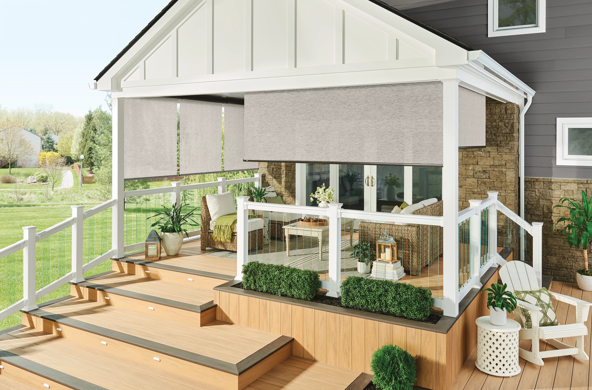 Exterior solar shades enclosing a covered patio