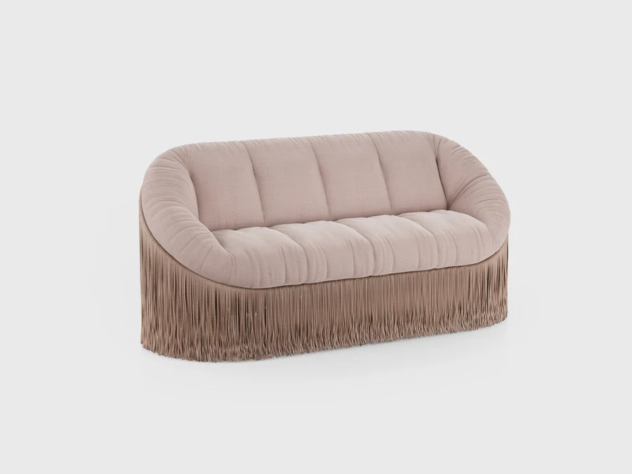 Tidelli Boho sofa with blush upholstery and a fringed base