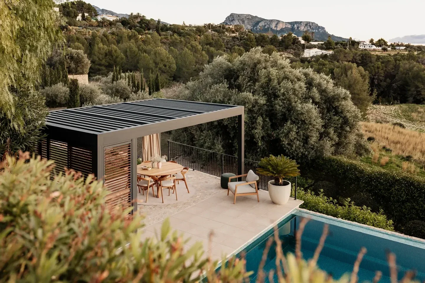 Renson Camargue pergola creating a shaded outdoor living area