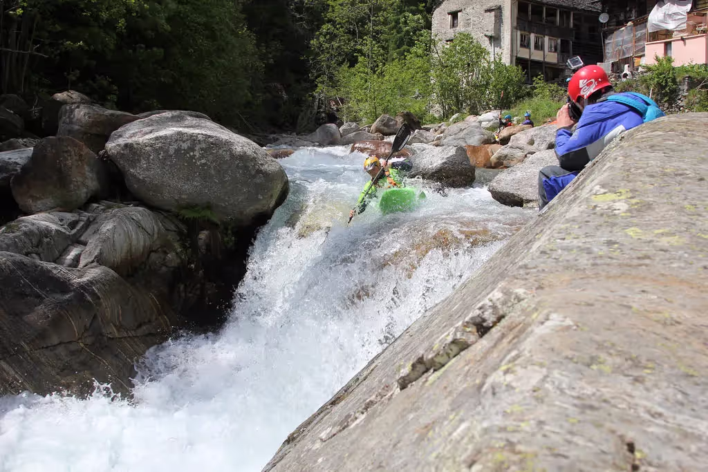 Image of a kayaker running a waterfall