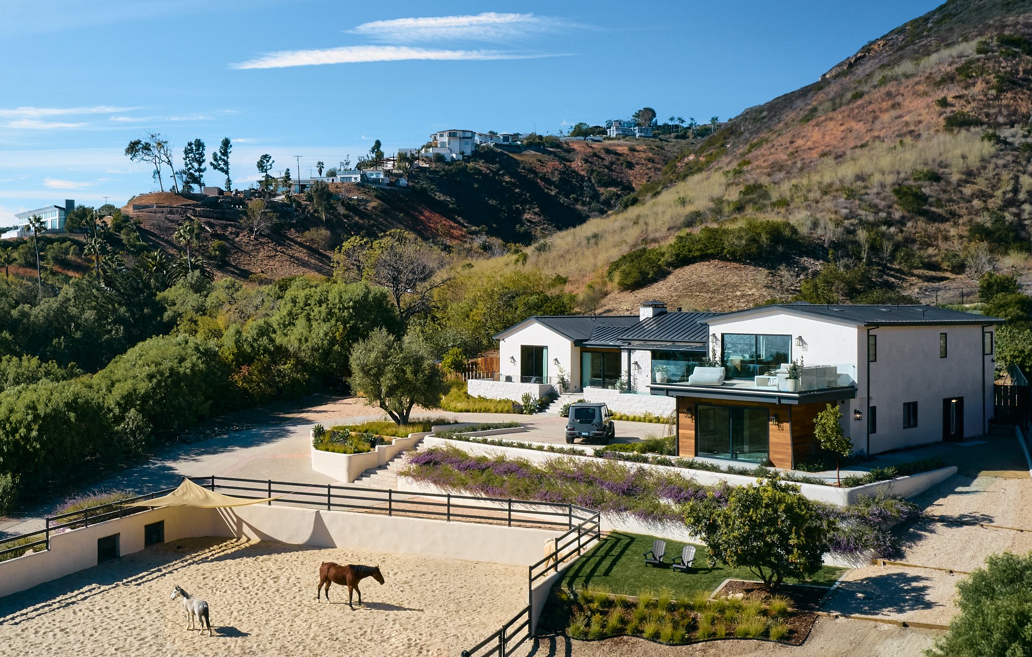 Custom home Energize Builders built on Cuthbert Road in Malibu, set in open hills
