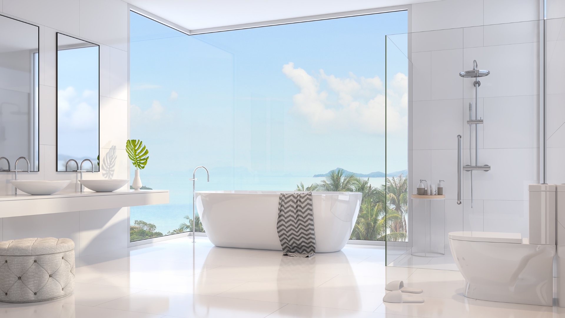 Luxury full bathroom remodel with soaking tub, double vanity, and ocean view.