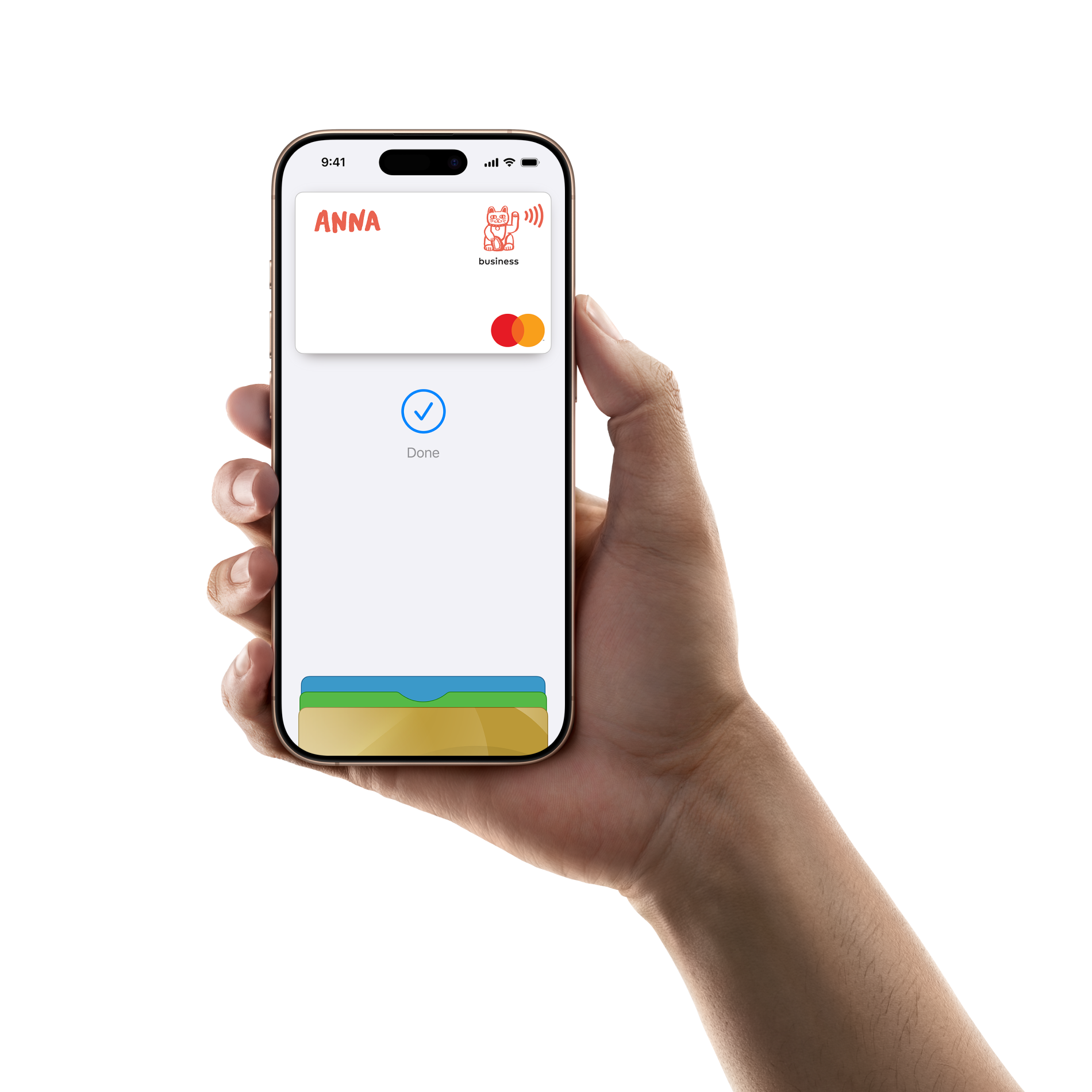 Hand holding a smartphone displaying a digital Mastercard with the name ANNA and a 'Done' checkmark on the screen.